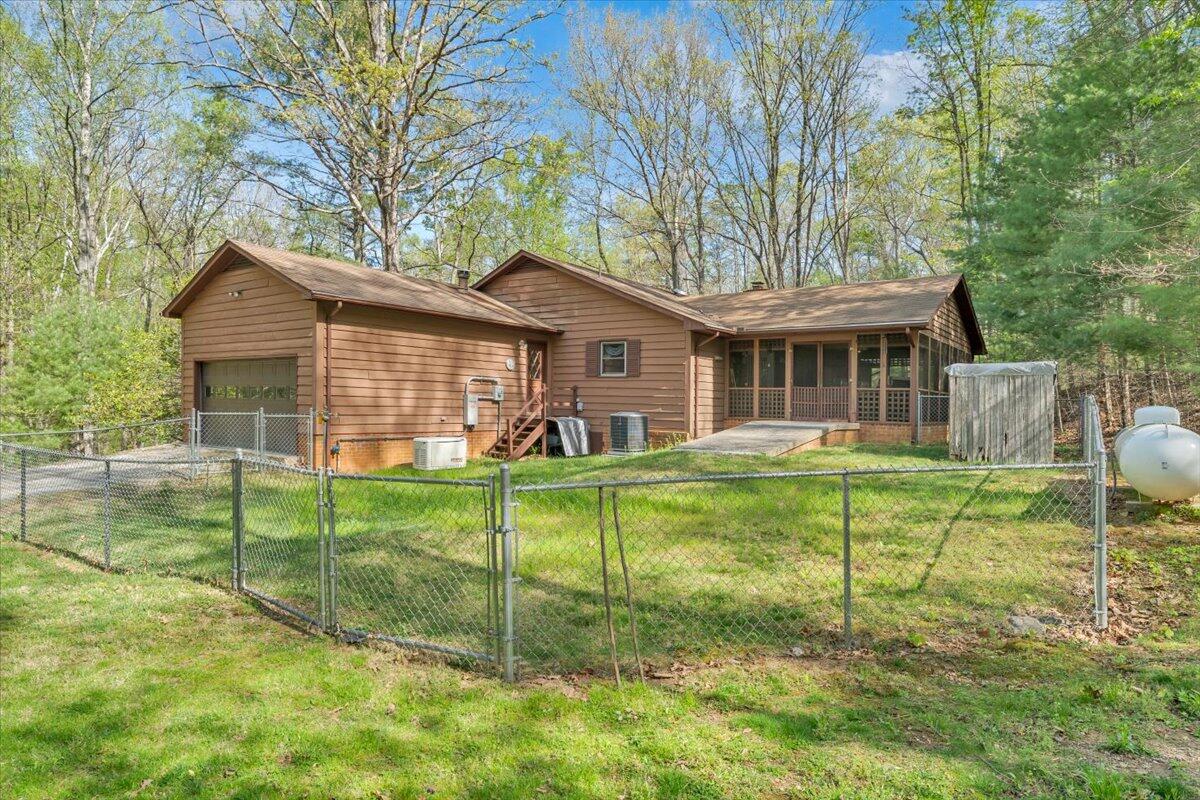 3878 Harborwood Road Salem, VA 24153 - Photo 43 of 60 a view of a house with a yard and a large tree