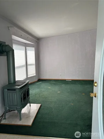 a view of backyard with a table and chair