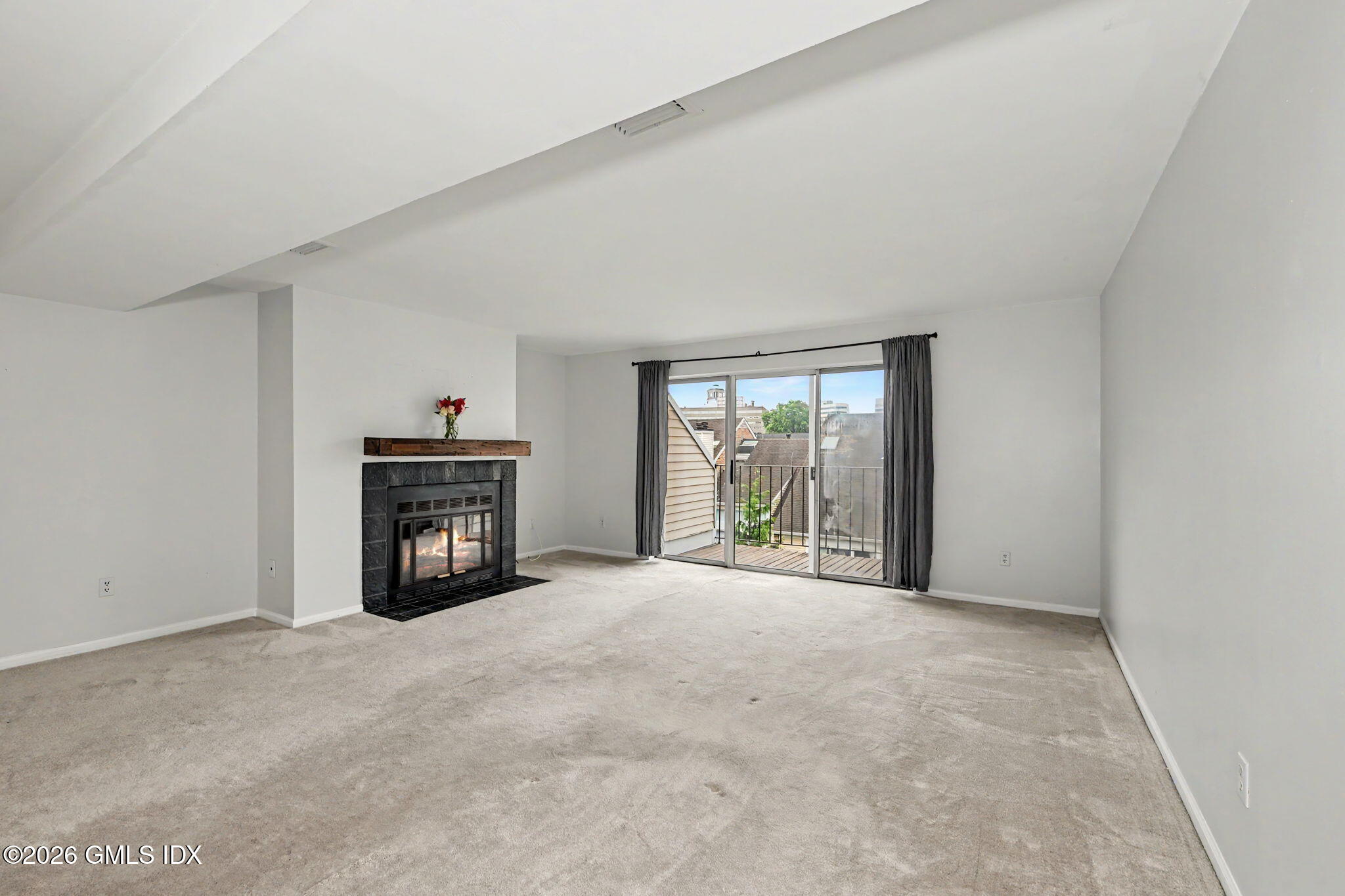 21 Highland Road, Unit 21 Stamford, CT 06901 - Photo 2 of 19 Living Room with Sliders