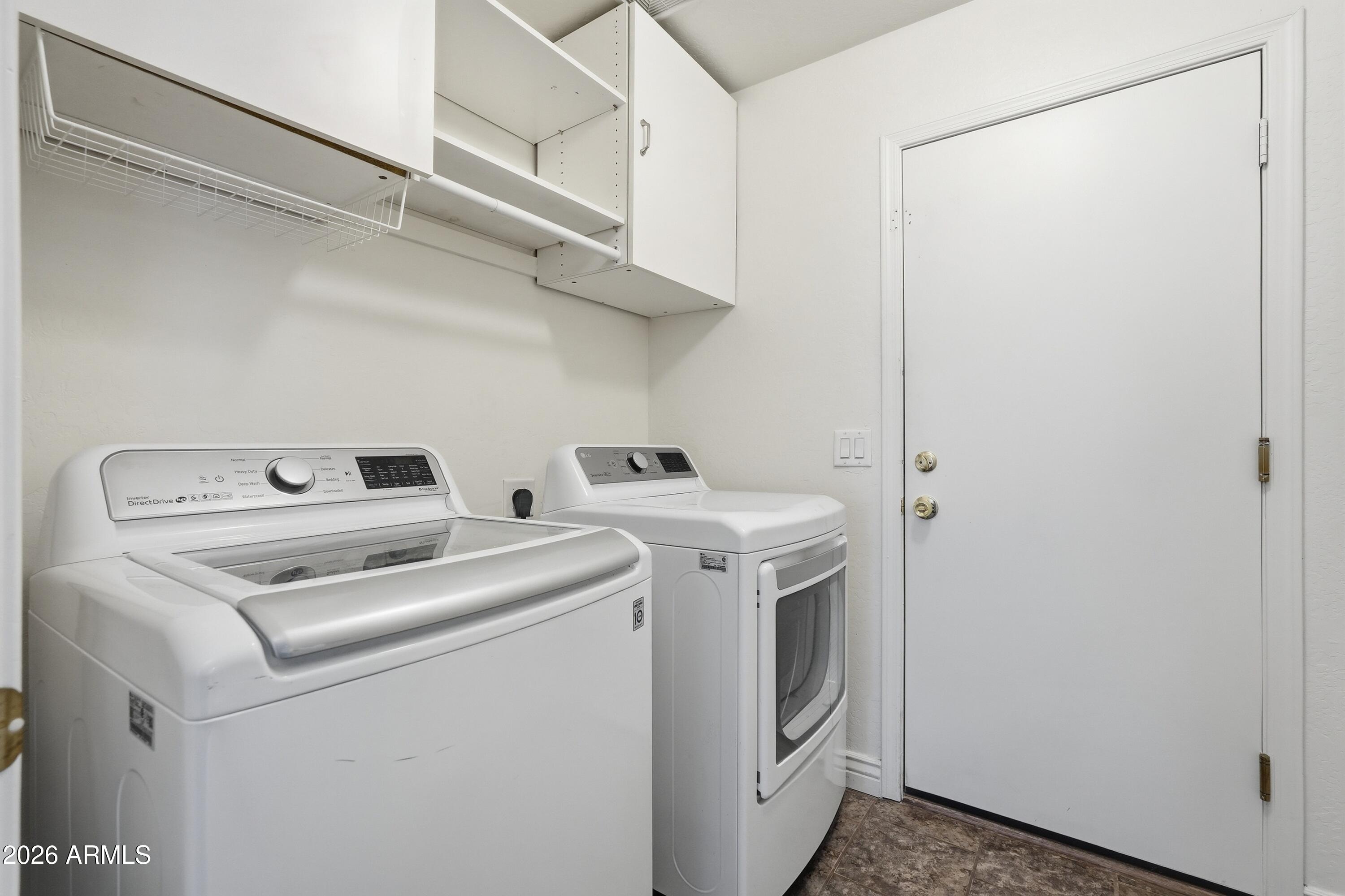 3242 East Bonanza Road Gilbert, AZ 85297 - Photo 34 of 36 a utility room with dryer and washer