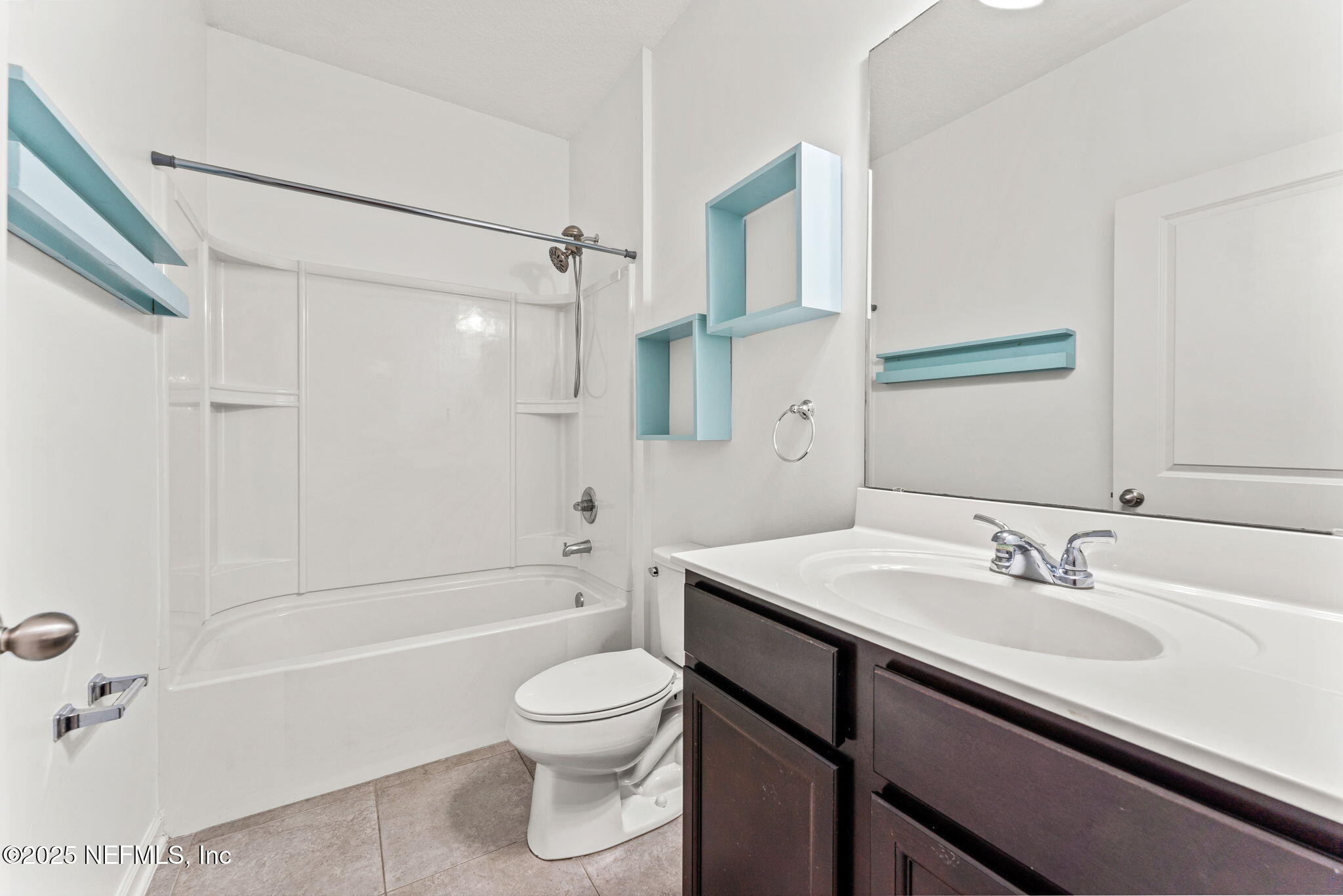 83029 Dowitcher Place Yulee, FL 32097 - Photo 27 of 40 a bathroom with a sink a toilet and shower