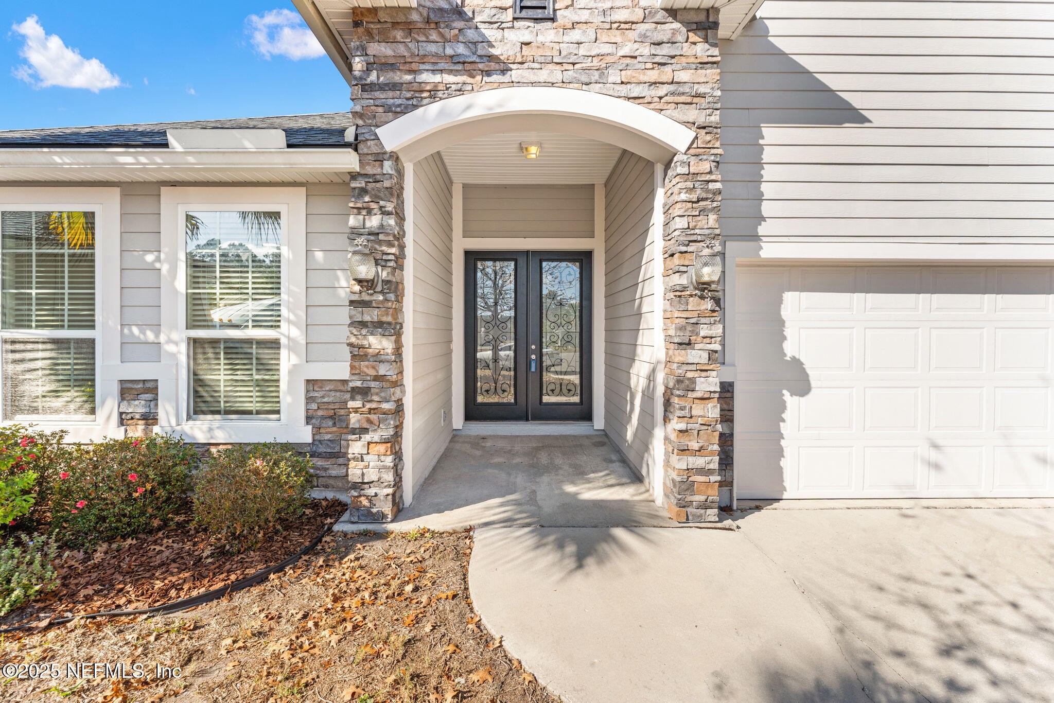 83029 Dowitcher Place Yulee, FL 32097 - Photo 4 of 40 a view of a house with a outdoor space
