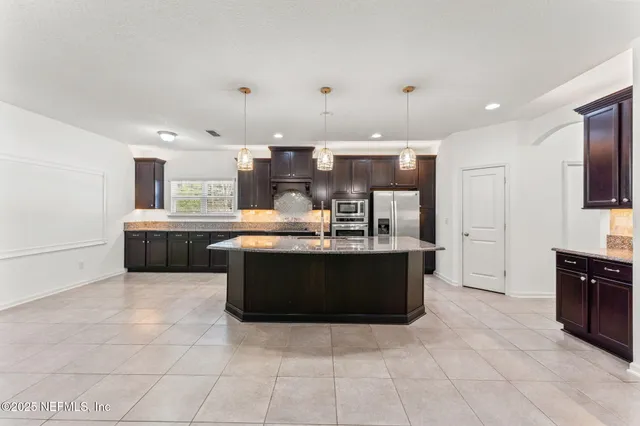 $675,000 | 83029 Dowitcher Place, Yulee, FL 32097