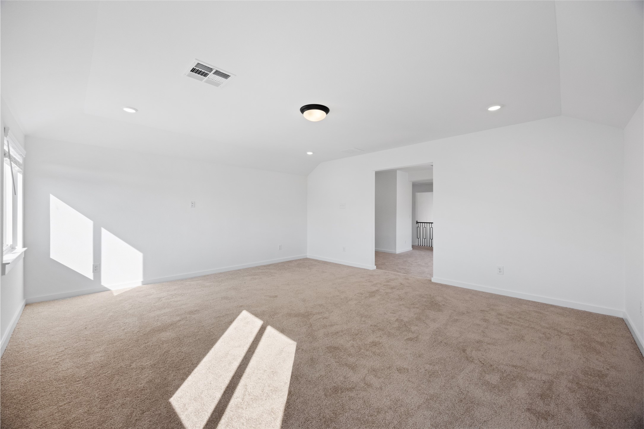 8326 Amethyst Valley Lane Angleton, TX 77515 - Photo 28 of 38 a view of an empty room with wooden floor and windows