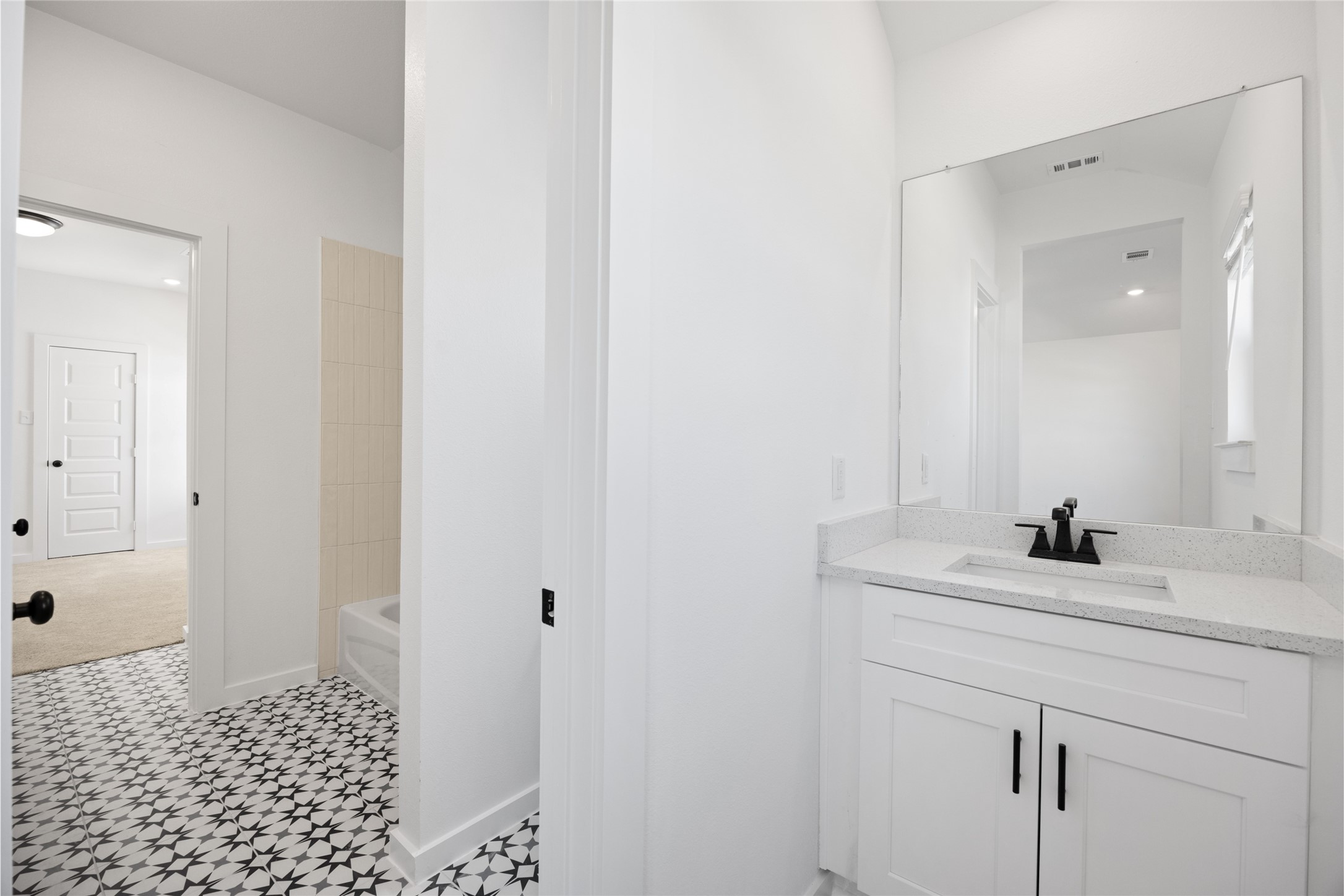 8326 Amethyst Valley Lane Angleton, TX 77515 - Photo 32 of 38 a bathroom with a sink a toilet and a mirror