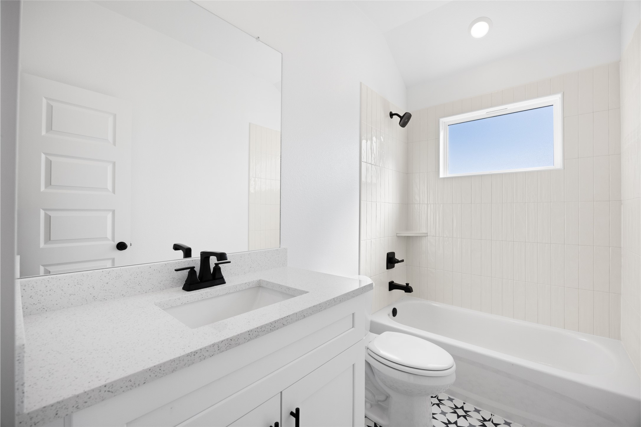 8326 Amethyst Valley Lane Angleton, TX 77515 - Photo 35 of 38 a bathroom with a sink a toilet and a bathtub