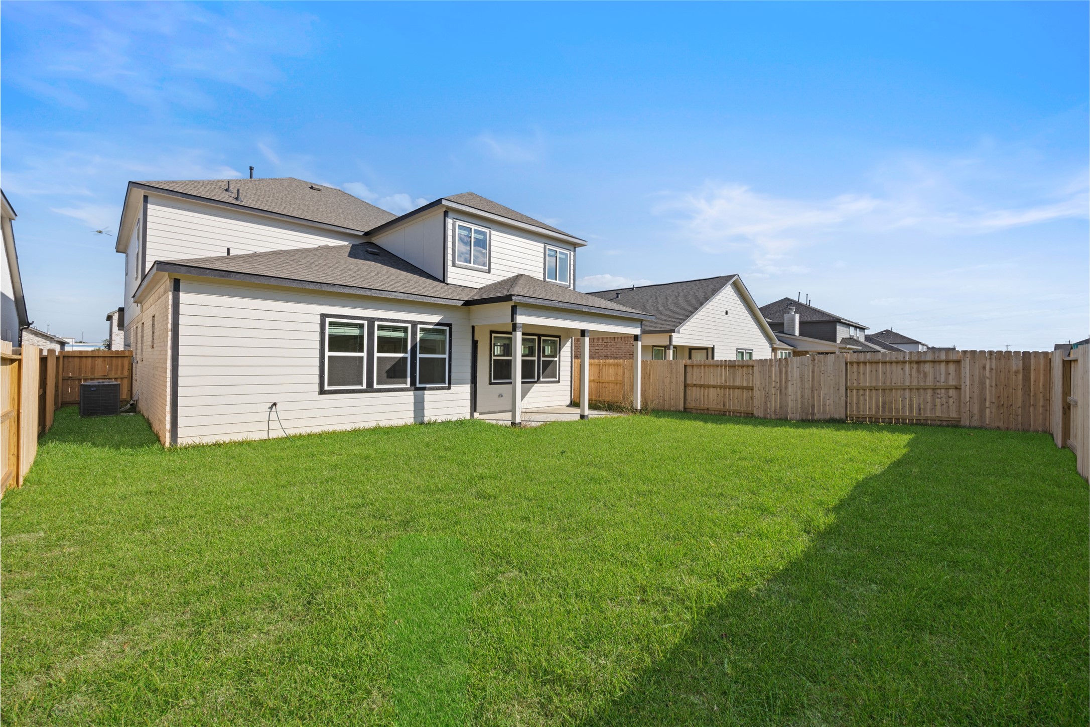 8326 Amethyst Valley Lane Angleton, TX 77515 - Photo 38 of 38 a view of a house with backyard and garden