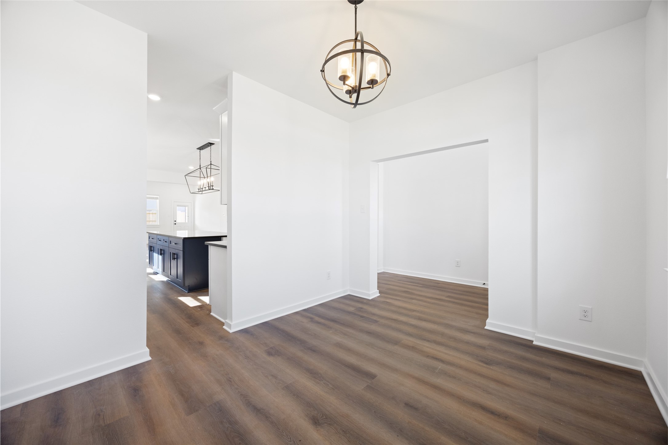 8326 Amethyst Valley Lane Angleton, TX 77515 - Photo 5 of 38 a view of empty room with wooden floor