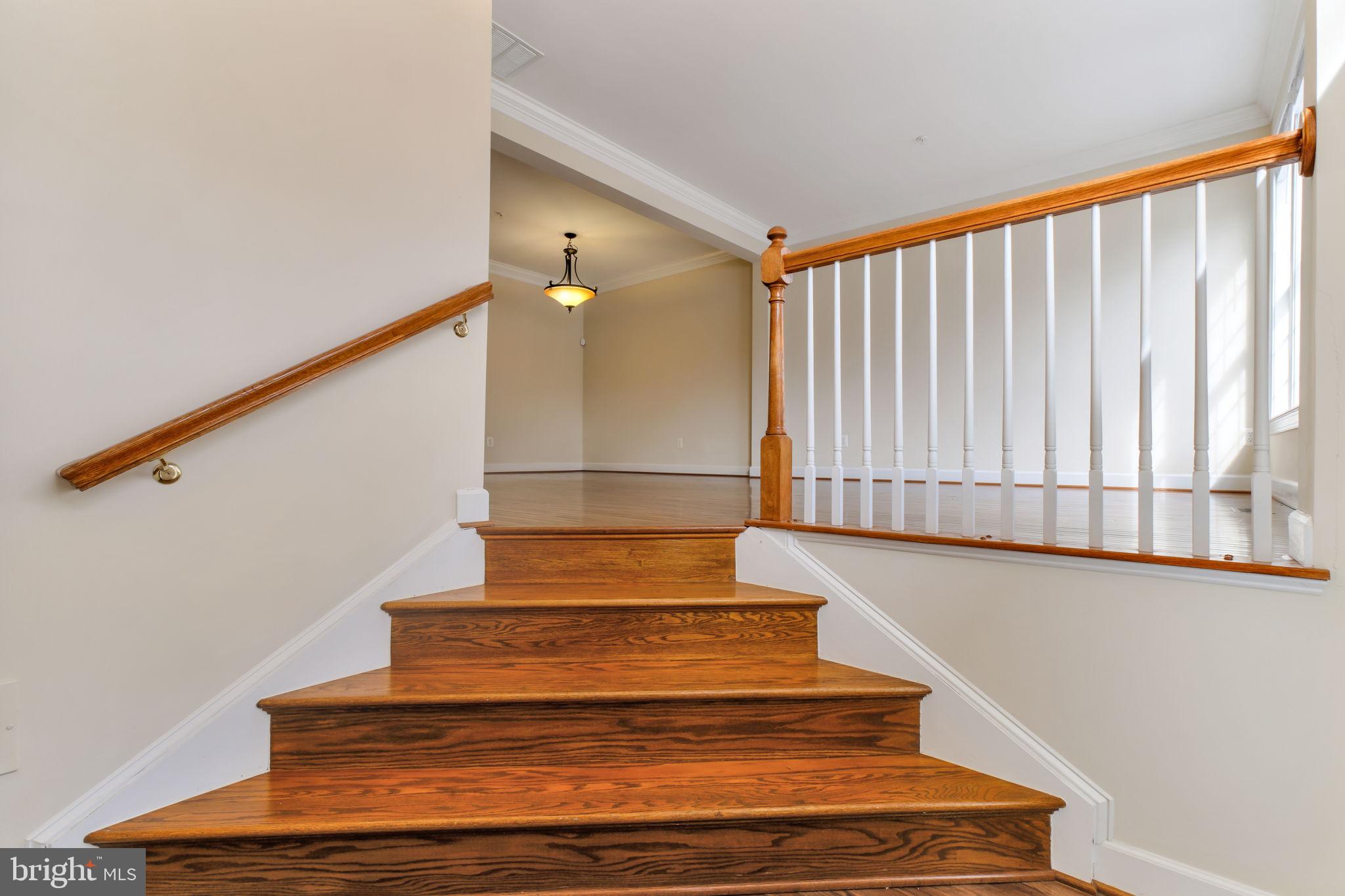 725 Ridgemont Avenue Rockville, MD 20850 - Photo 12 of 30 a view of entryway and hall with wooden floor