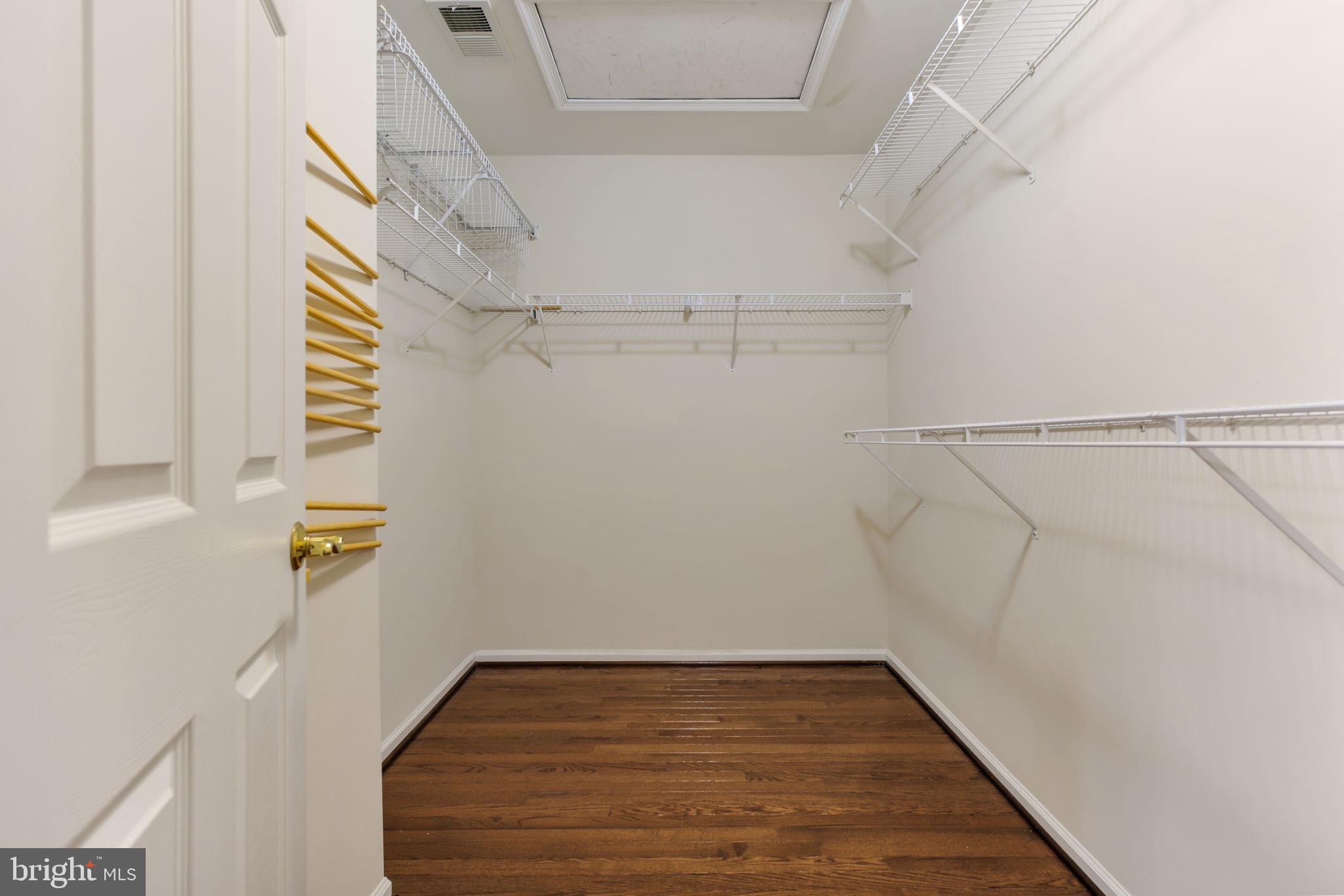 725 Ridgemont Avenue Rockville, MD 20850 - Photo 19 of 30 a view of walk in closet with empty racks