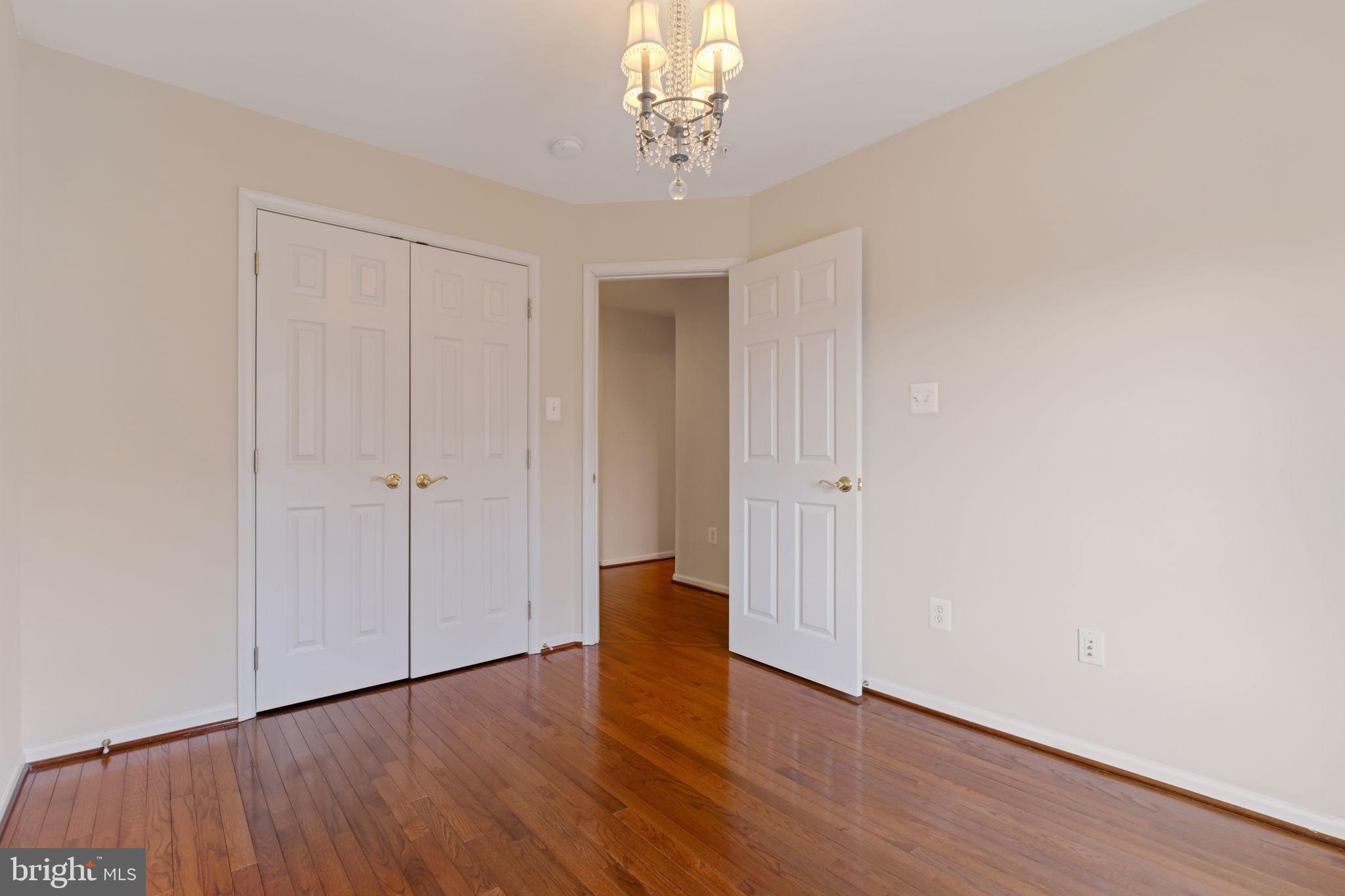 725 Ridgemont Avenue Rockville, MD 20850 - Photo 23 of 30 a view of an empty room with wooden floor
