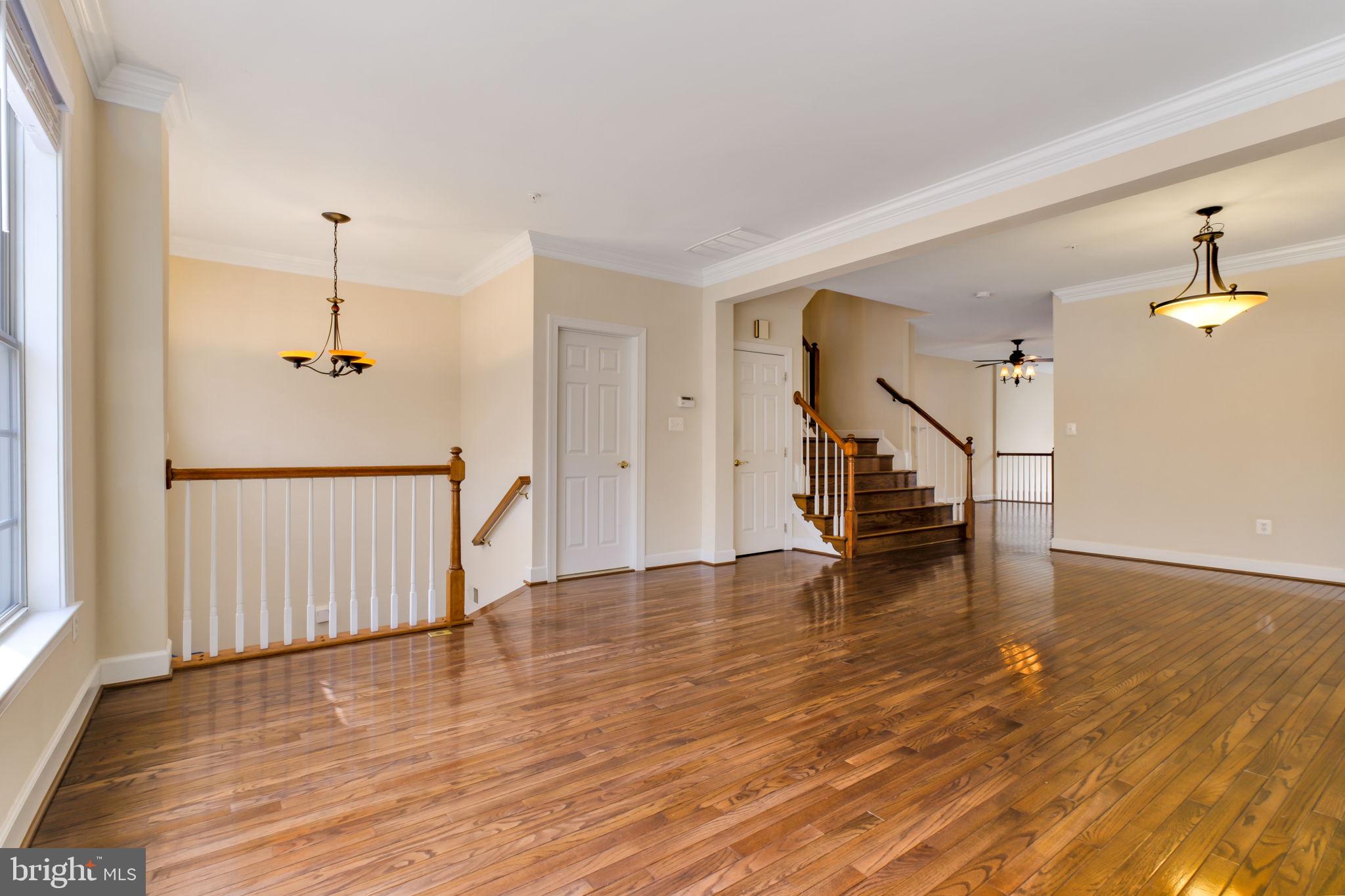 725 Ridgemont Avenue Rockville, MD 20850 - Photo 9 of 30 a view of an entryway with wooden floor