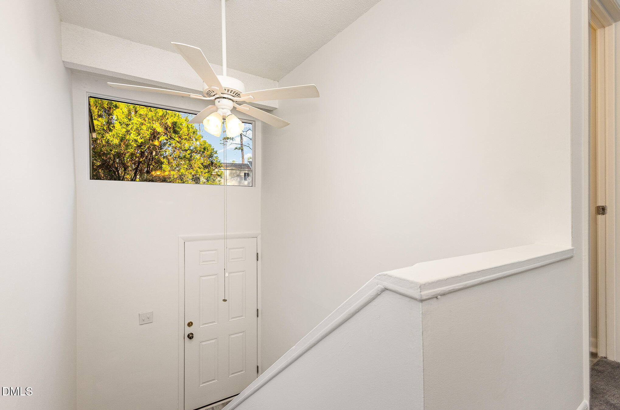 701 Godwin Court Raleigh, NC 27606 - Photo 15 of 29 a view of a hallway with a large window