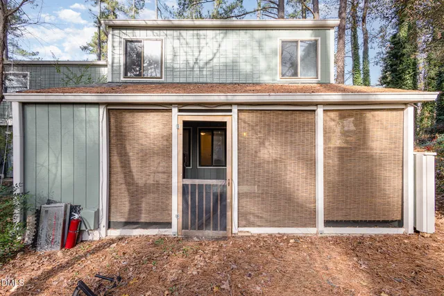a front view of a house with a outdoor space