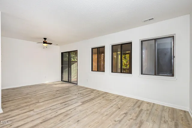 a view of an empty room with window