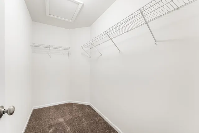 a view of a room with racks on the wall