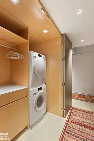 a room with a table and a mirror