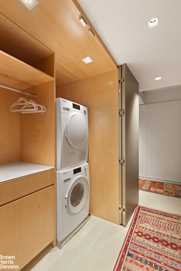 880 5th Avenue, Unit 7C Manhattan, NY 10021 - Photo 11 of 13 a view of kitchen and utility room
