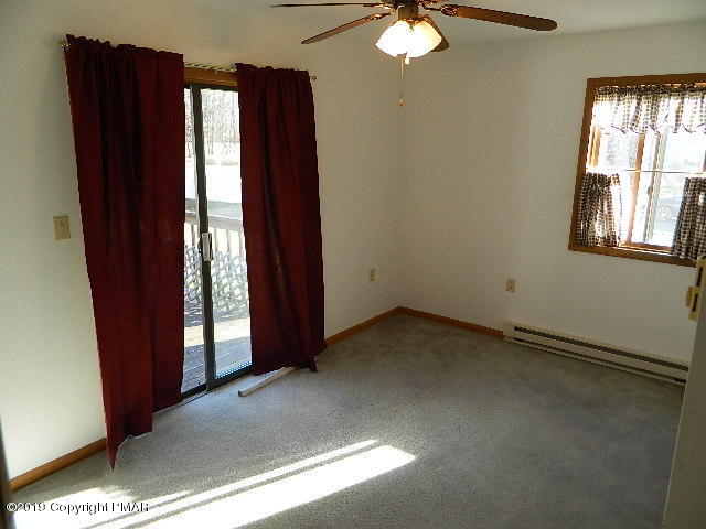 152 Chestnut Drive Bushkill, PA 18324 - Photo 27 of 34 an empty room with windows