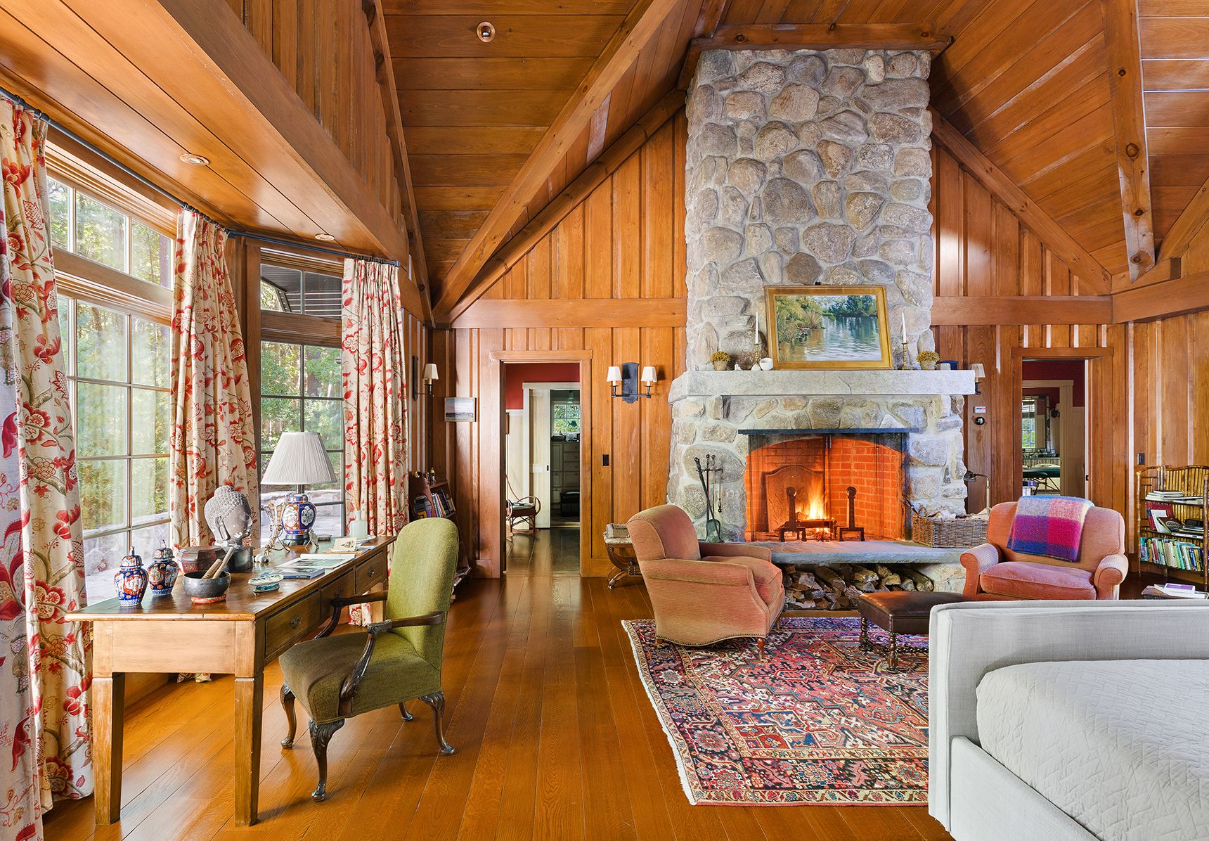 9 Two Holes Of Water Road East Hampton, NY 11937 - Photo 23 of 52 a living room with furniture or couch and a fireplace