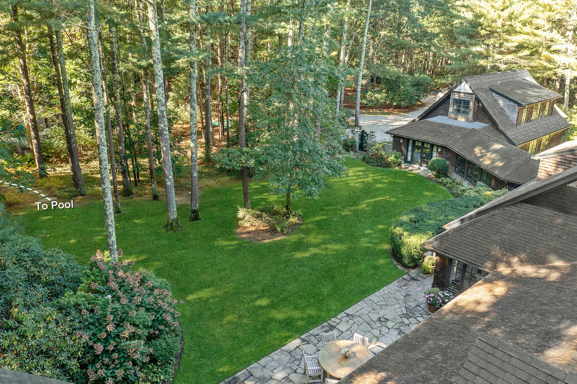 9 Two Holes Of Water Road East Hampton, NY 11937 - Photo 31 of 52 a view of a house with a yard