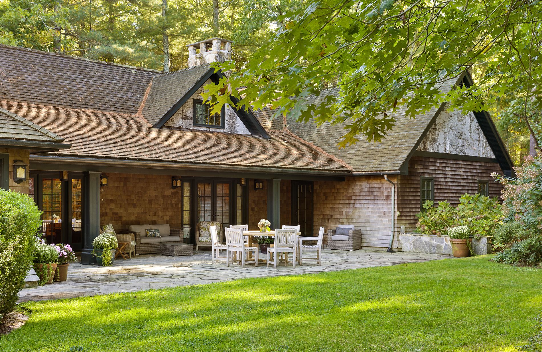 9 Two Holes Of Water Road East Hampton, NY 11937 - Photo 34 of 52 a view of a house with backyard porch and sitting area