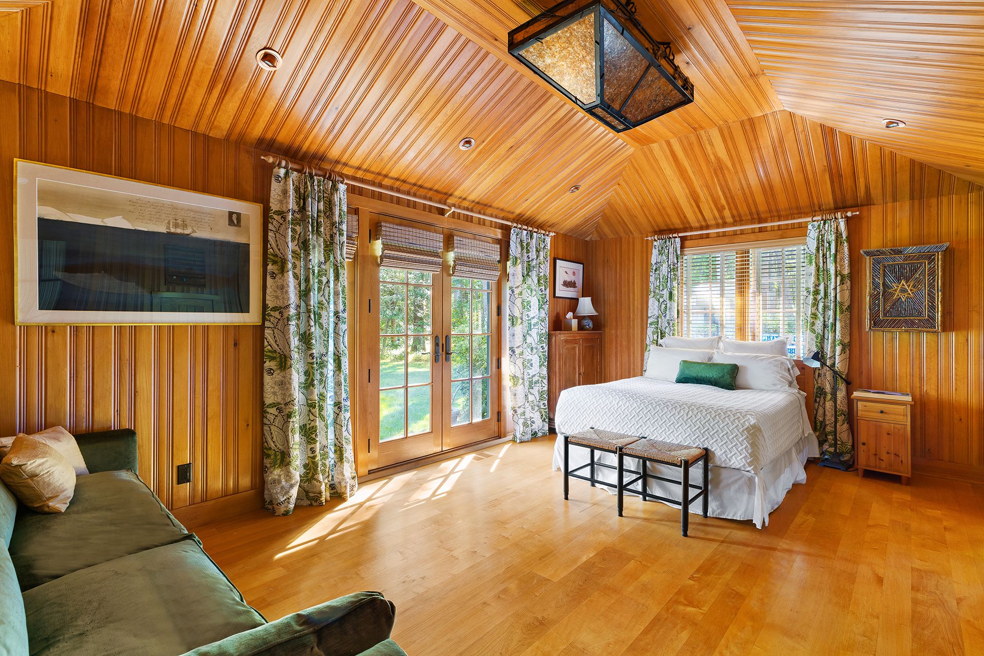 9 Two Holes Of Water Road East Hampton, NY 11937 - Photo 41 of 52 a living room with furniture a flat screen tv and a dining table