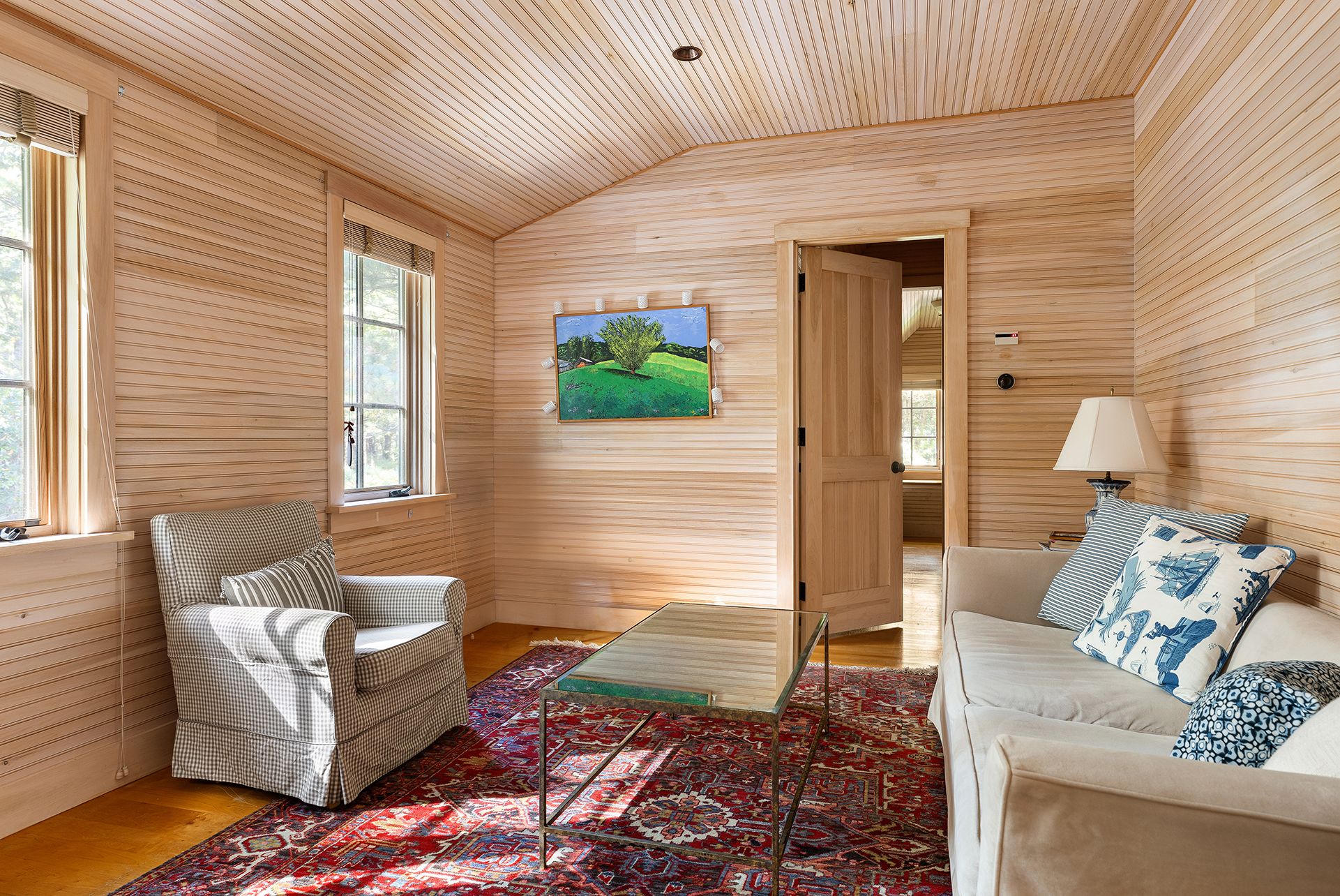 9 Two Holes Of Water Road East Hampton, NY 11937 - Photo 42 of 52 a living room with furniture and a flat screen tv