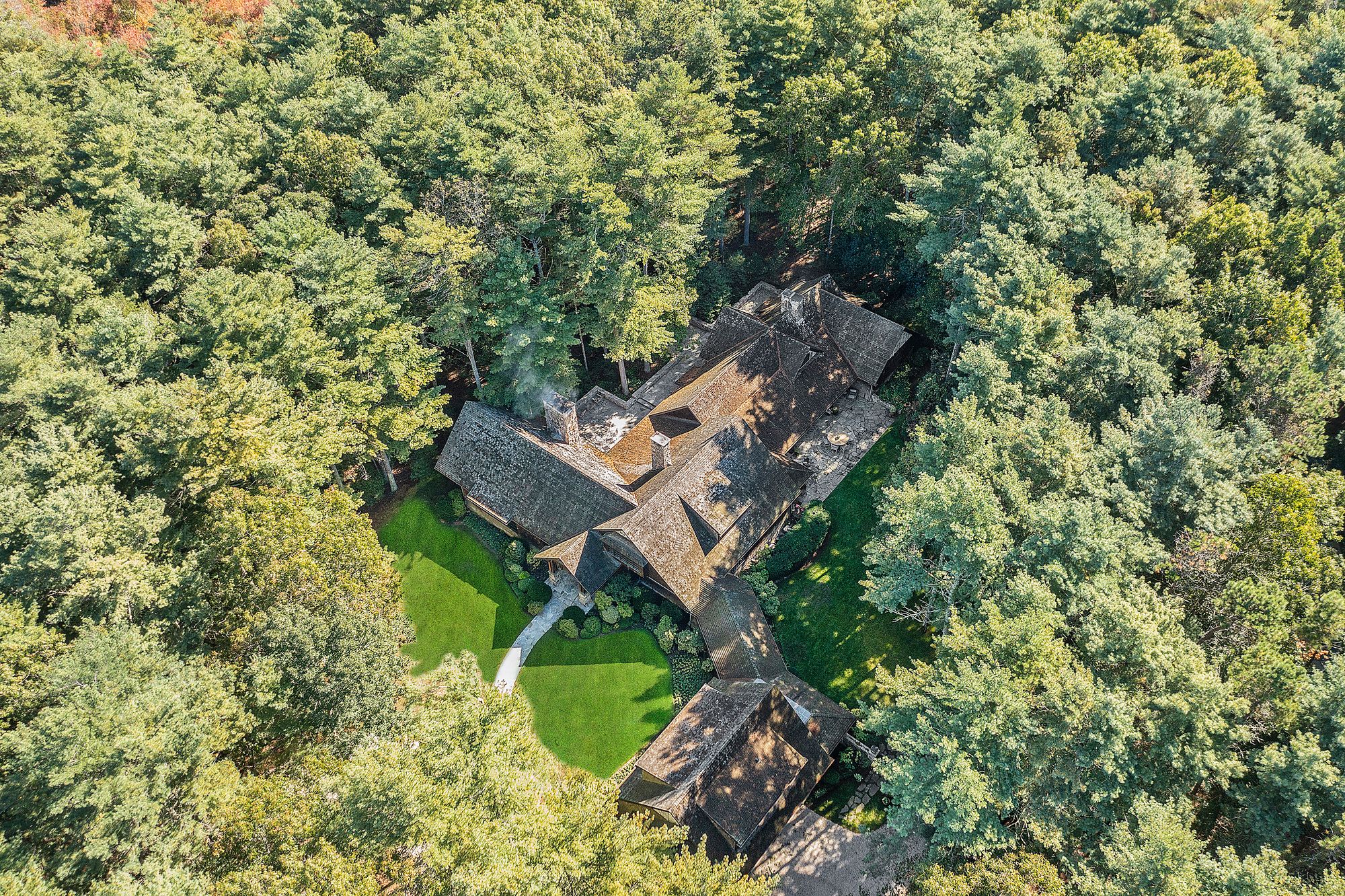 9 Two Holes Of Water Road East Hampton, NY 11937 - Photo 49 of 52 an aerial view of a house with a yard