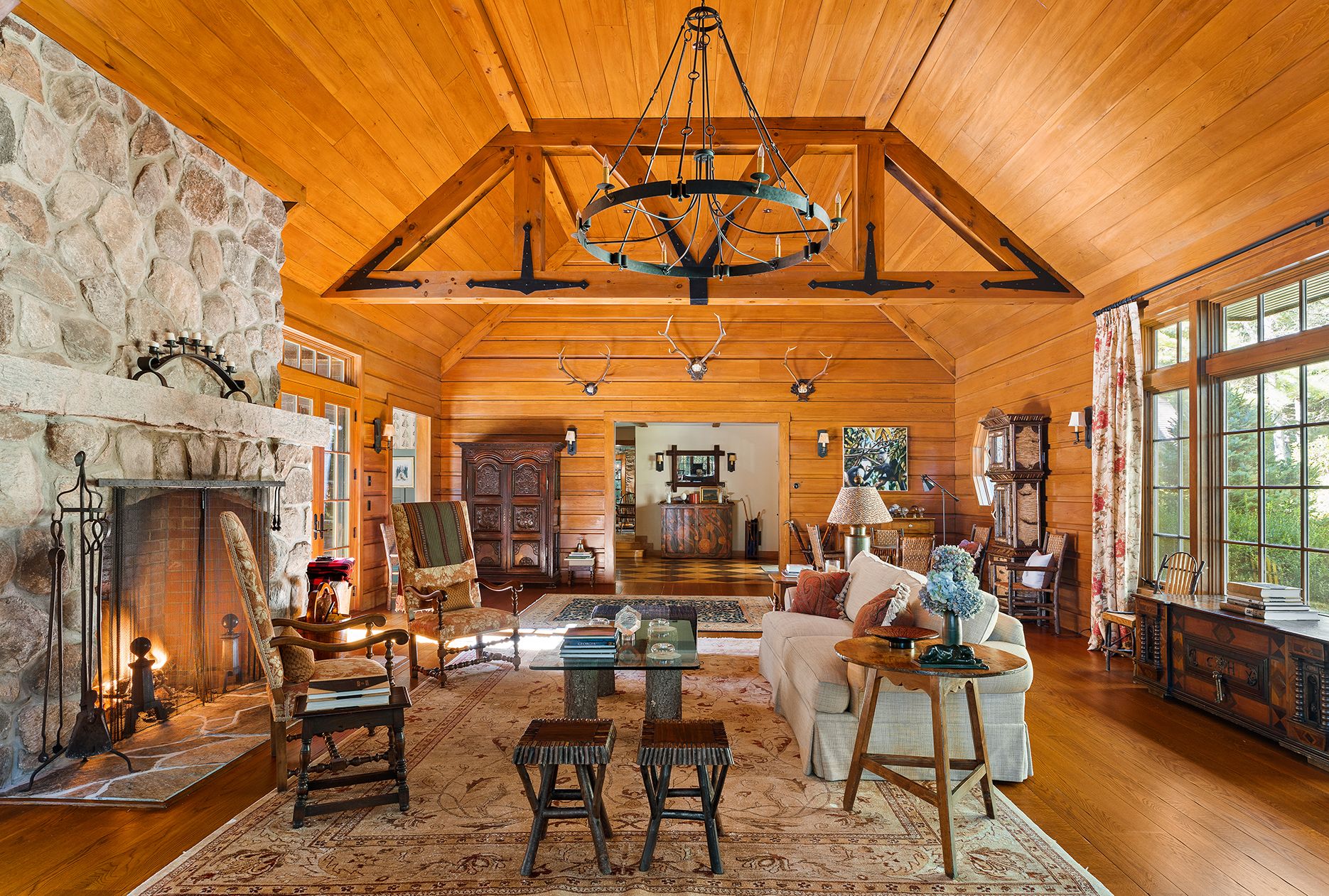 9 Two Holes Of Water Road East Hampton, NY 11937 - Photo 8 of 52 a view of a chairs and tables in patio