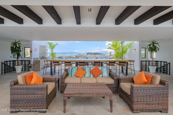 a view of a patio with swimming pool