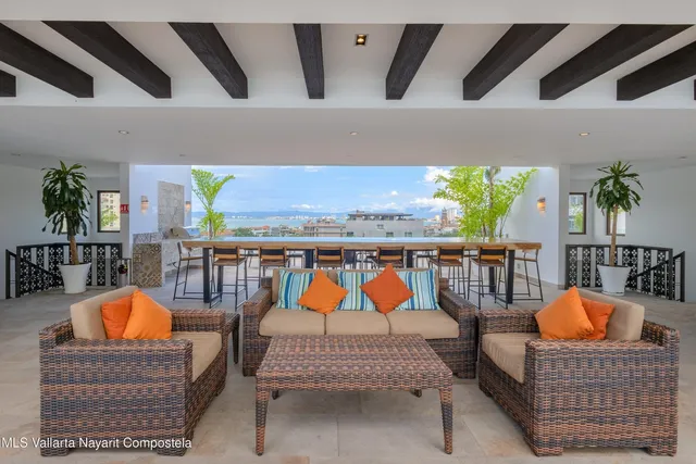 a view of a patio with swimming pool