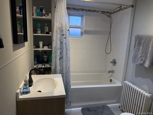 a bathroom with a sink and a bathtub