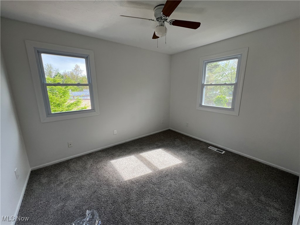 1279 Lander Road Cleveland, OH 44124 - Photo 30 of 37 2ND BEDROOM with a ceiling fan, baseboards, visible vents, and carpet floors
