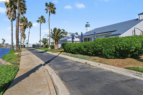 a view of a street with a building in the background