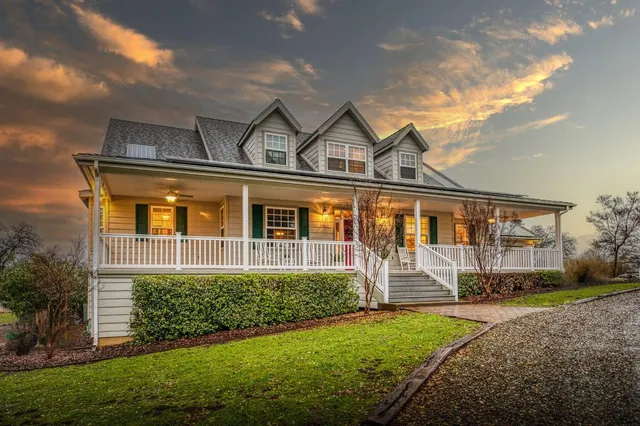 a view of a street with a building in the background