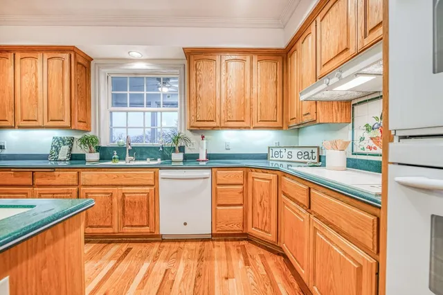 a spacious bedroom with a bed and a window