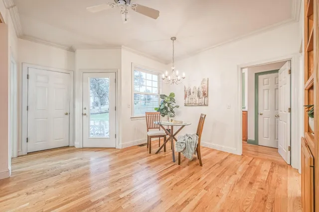 a bathroom with a toilet a sink and a mirror
