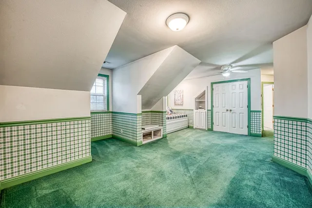 a kitchen with stainless steel appliances a sink stove and refrigerator