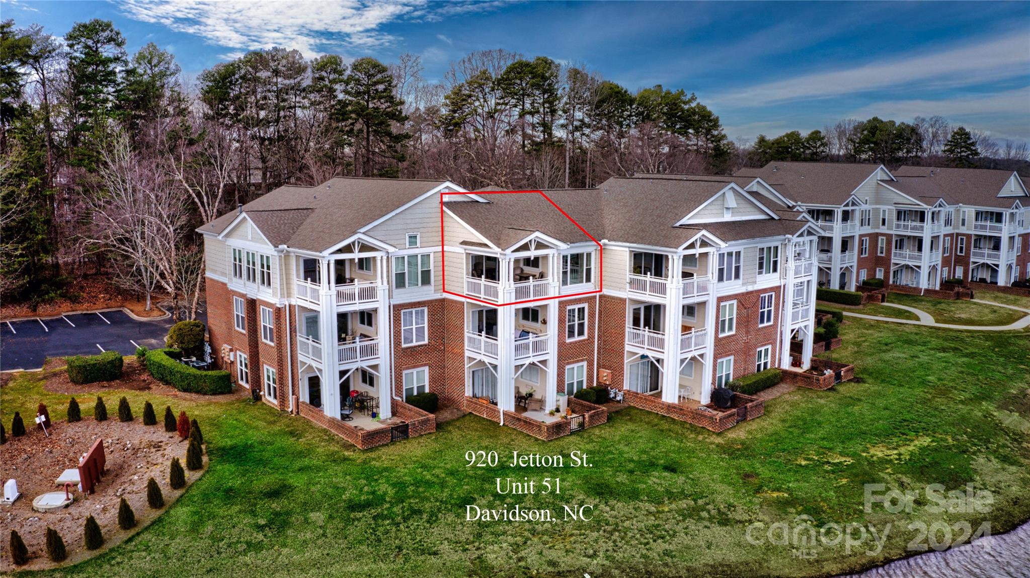 920 Jetton Street Davidson, NC 28036 - Photo 2 of 6 front view of a house with a yard