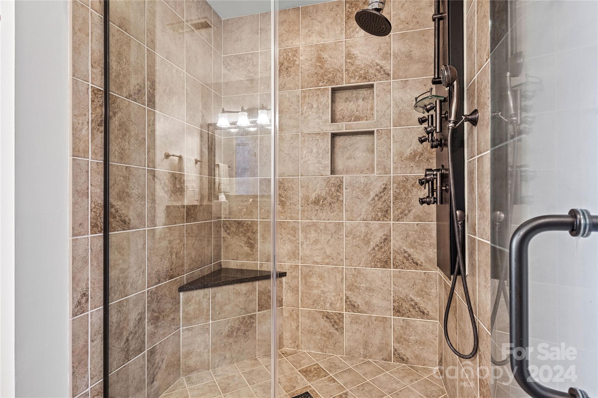 920 Jetton Street Davidson, NC 28036 - Photo 5 of 6 a bathroom with a shower