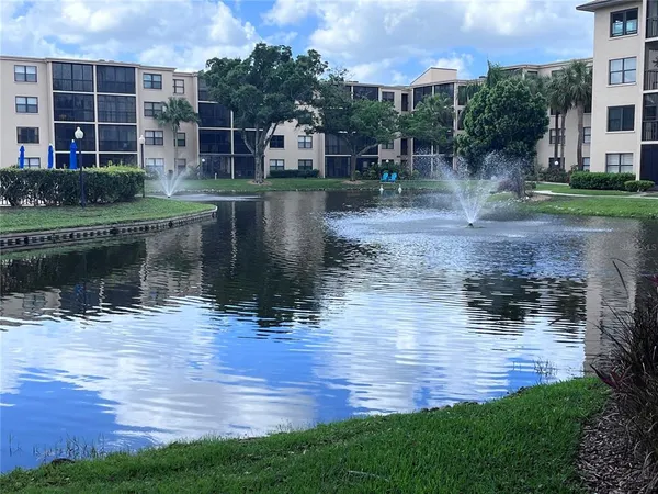 a view of a lake with a house