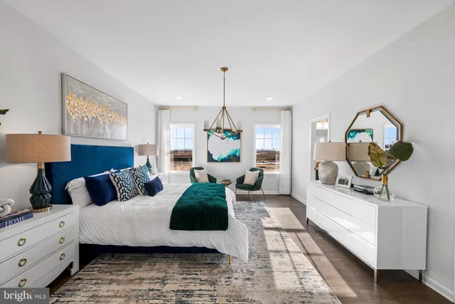 a bedroom with bed and window