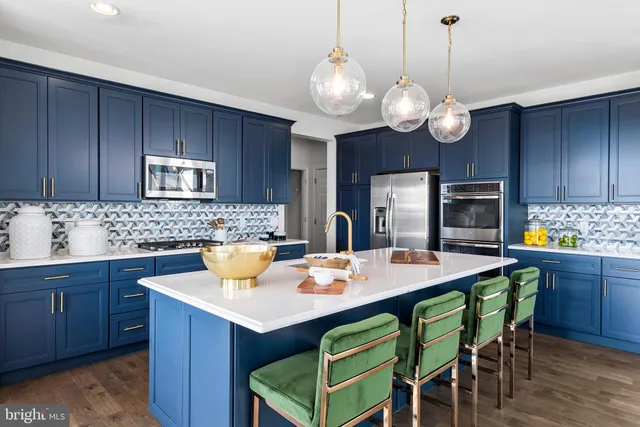 a view of kitchen with granite countertop breakfast area