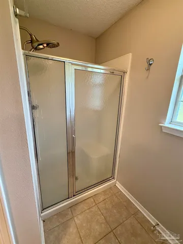 an empty room with wooden floor