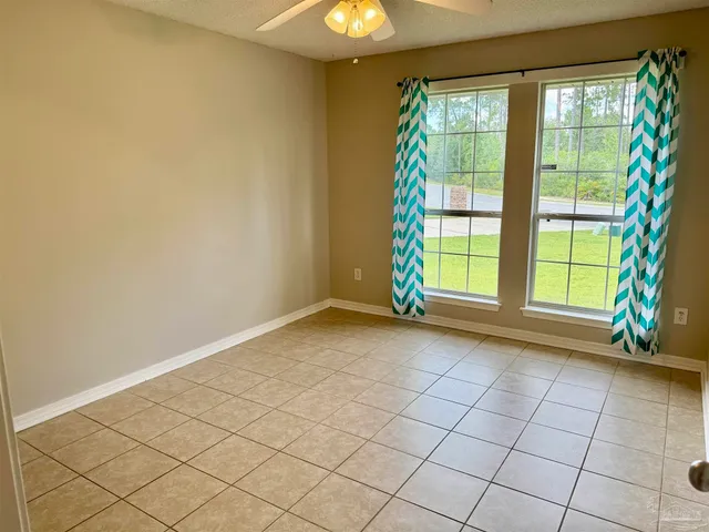 a view of a backyard with a small cabin