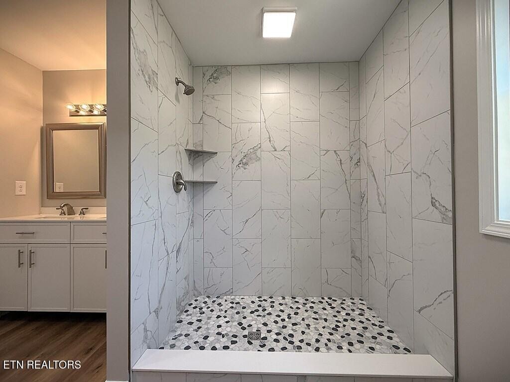 246 Ralph Spivey Lane Hilham, TN 38568 - Photo 27 of 53 a bathroom with a shower