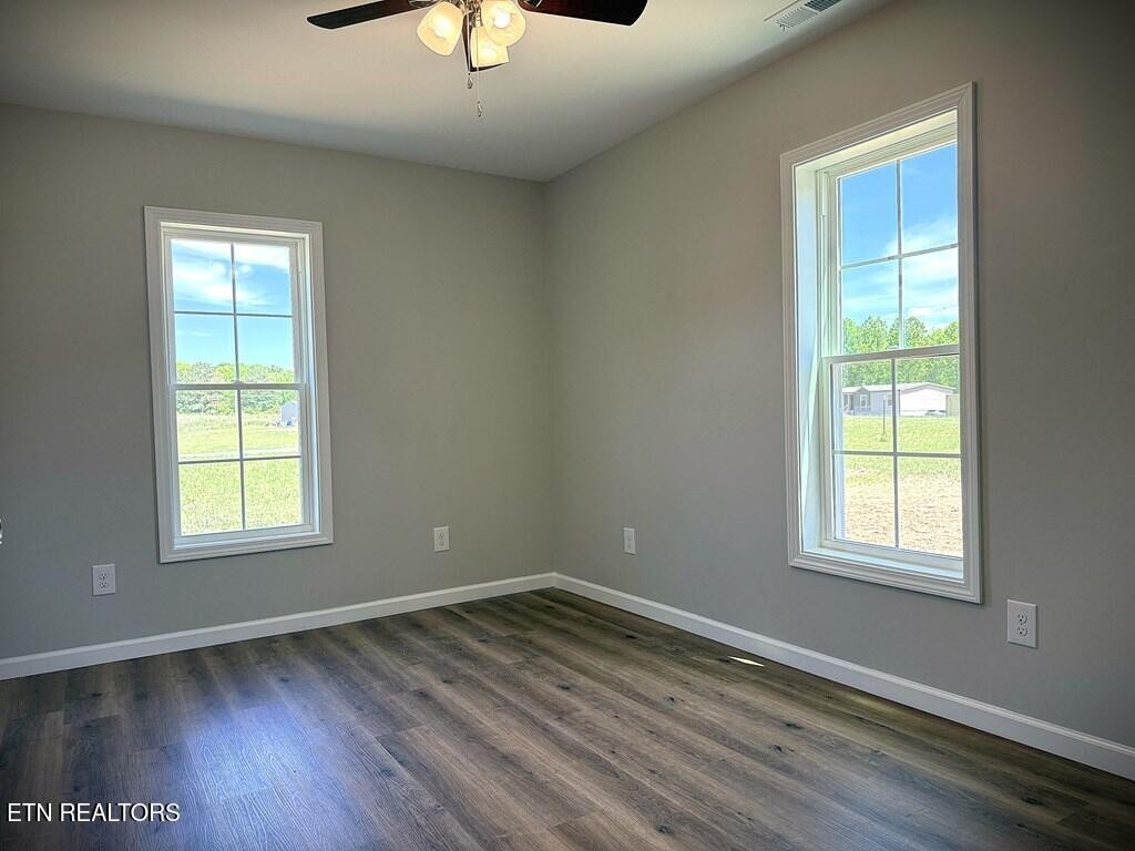246 Ralph Spivey Lane Hilham, TN 38568 - Photo 38 of 53 an empty room with a window