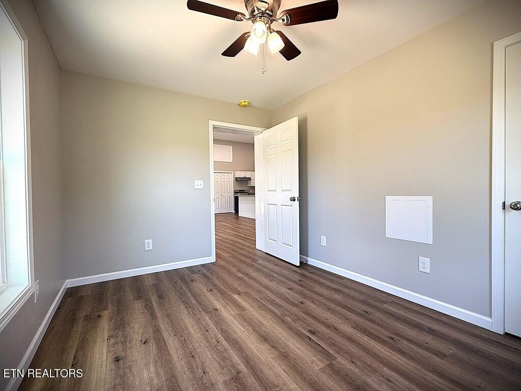 246 Ralph Spivey Lane Hilham, TN 38568 - Photo 39 of 53 a view of empty room with wooden floor