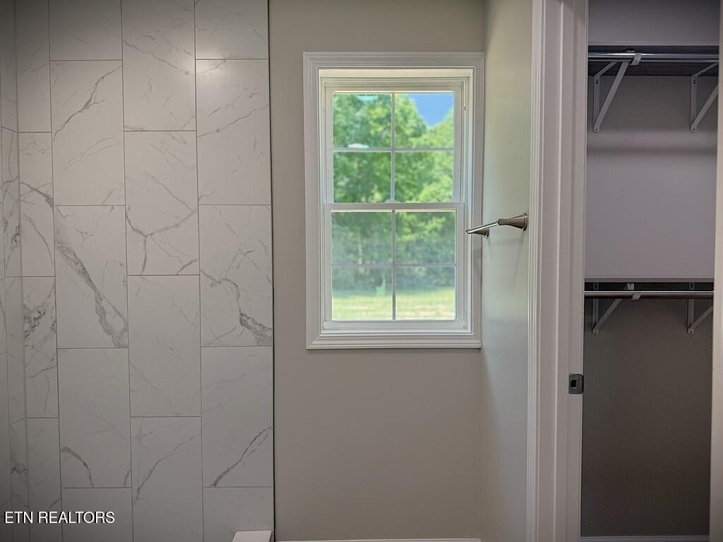 246 Ralph Spivey Lane Hilham, TN 38568 - Photo 42 of 53 a bathroom with a window